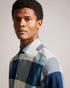 NEETLY-Shirts-Crafted from a blend of cotton and lyocell, NEETLY offers all-day comfort. This shirt's timeless silhouette adds to its wear-anywhere appeal, while the check print adds easy texture to your outfits. Button up shirt Large house check print Cotton and lyocell blend Long sleeves Classic collar Branded label O'Shea is 6'2.5" / 1.89m and wears Medium Blue in a Ted size 3- Ted Baker Romania